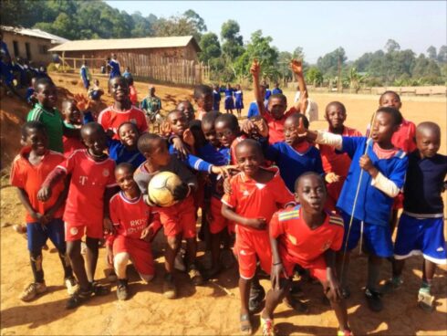 Caamay children playing football